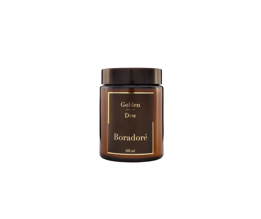 Boradoré Golden Dew interior perfume in amber glass bottle on white background
