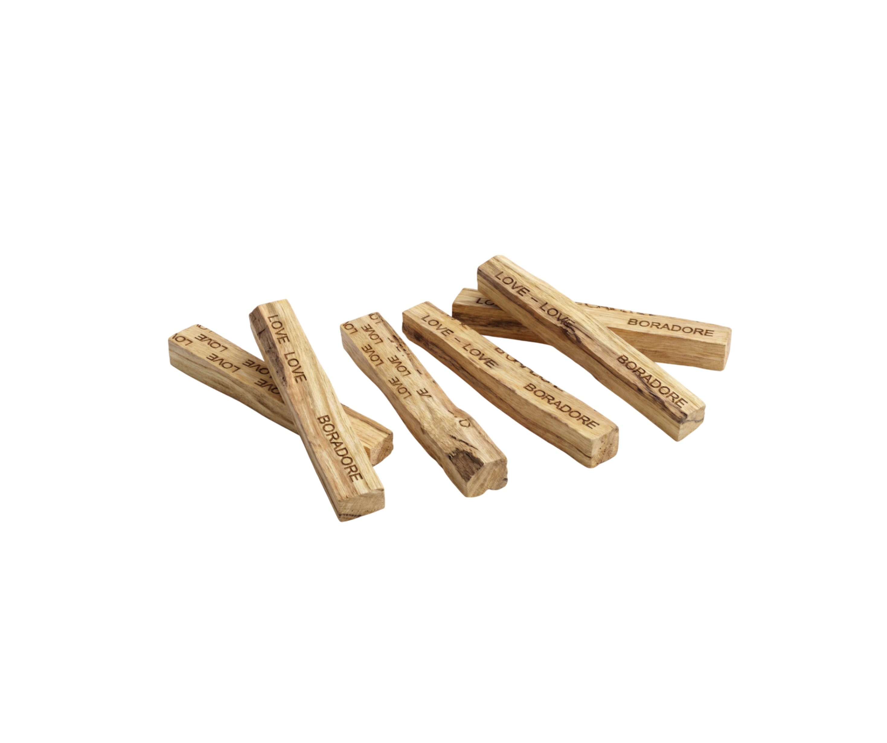 Boradoré palo santo wood sticks arranged on a white background
