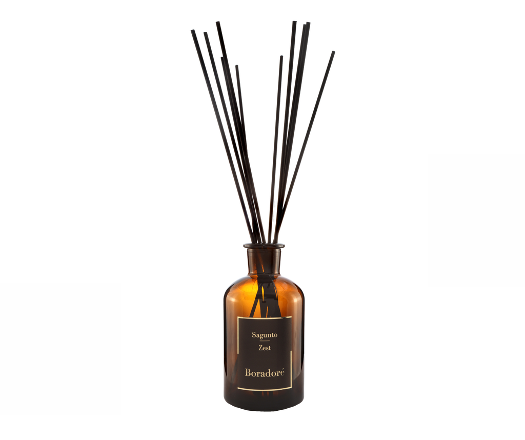 Boradoré Sagunto Zest reed diffuser in amber glass bottle on white background
