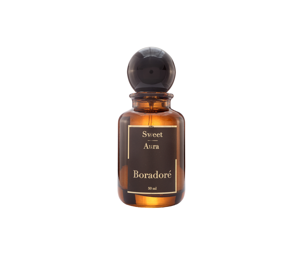 
Boradoré Sweet Aura interior perfume in amber glass bottle on white background
