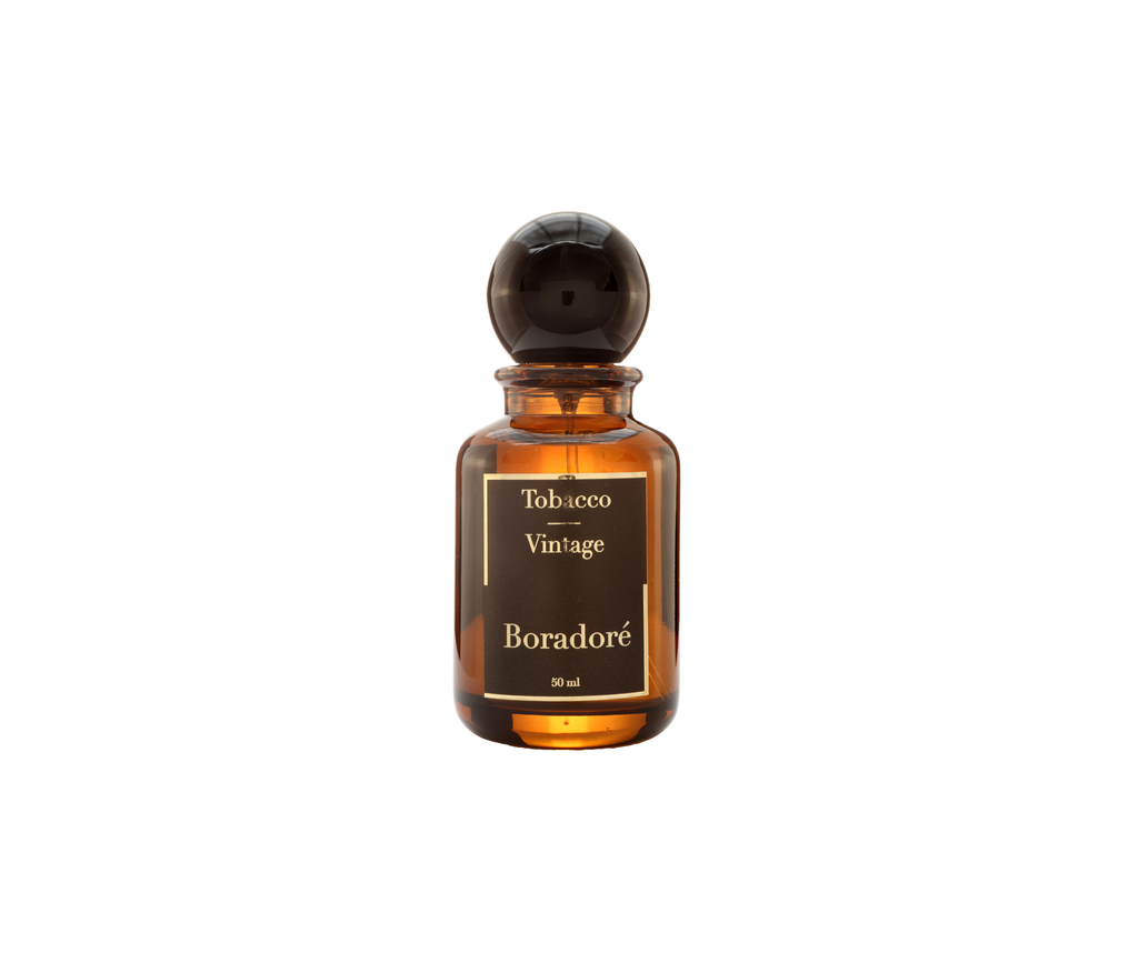 Boradoré Tobacco Vintage interior perfume in amber glass bottle on white background